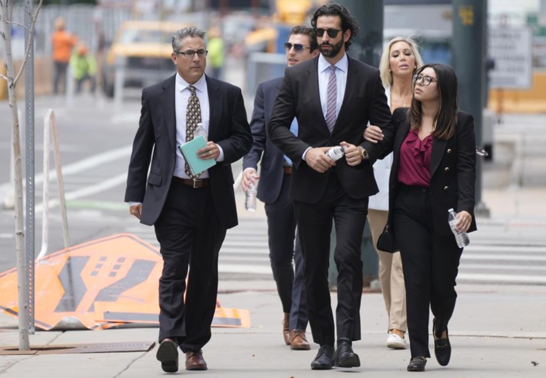 Larry and Bianca Rudolph’s Children Julian and Ana walking into federal court in Denver