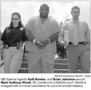 GBI Agents arresting Mark Woolf for criminal solicitation to commit armed robbery on July 21st, 2005.