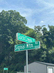 Suck Creek Road and Signal Mountain Road Signs
