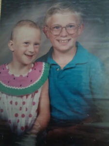 Travis Calumpit and his sister Anna Underhill as children