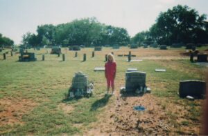 Corina Boyd as a child at her mother Rhonda’s grave Courtesy: Corina Boyd
